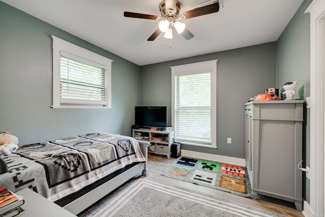 2709 Ottawa Dr, North Little Rock, AR 72116 - bedroom featuring wood finished floors and a ceiling fan