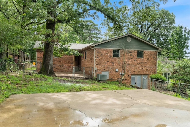1112 N Hughes St, Little Rock, AR 72007 - back of house with brick siding and a patio