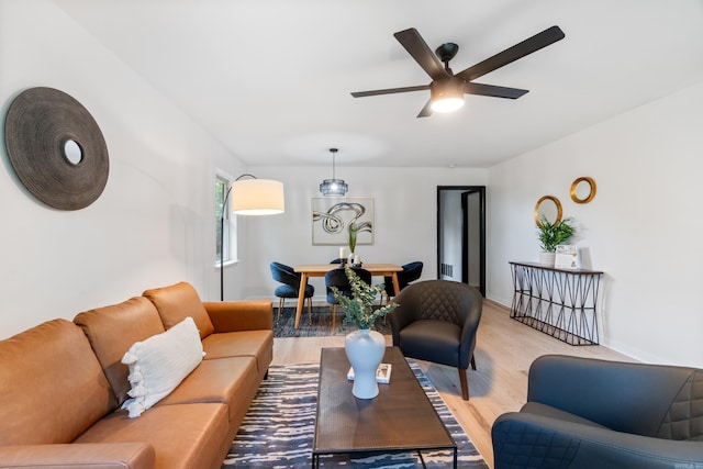 1112 N Hughes St, Little Rock, AR 72007 - living room with light wood-style floors and ceiling fan