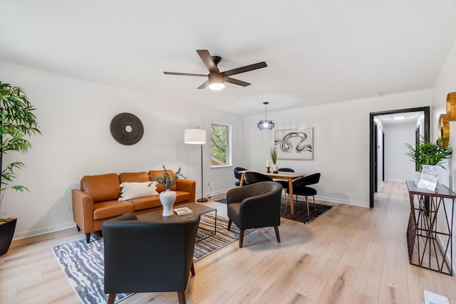 1112 N Hughes St, Little Rock, AR 72007 - living area featuring a ceiling fan and light wood-type flooring