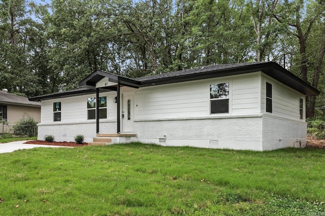 43 S Wakefield Dr, Little Rock, AR 72209 - view of front of house with crawl space, brick siding, and a front yard