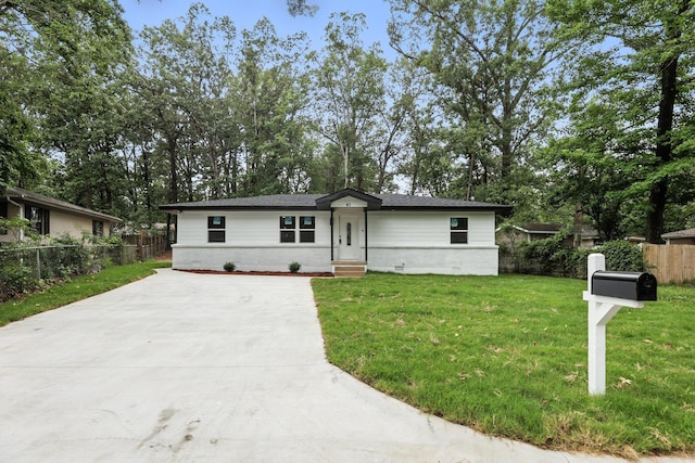 43 S Wakefield Dr, Little Rock, AR 72209 - view of front of house featuring concrete driveway, crawl space, and view of scattered trees