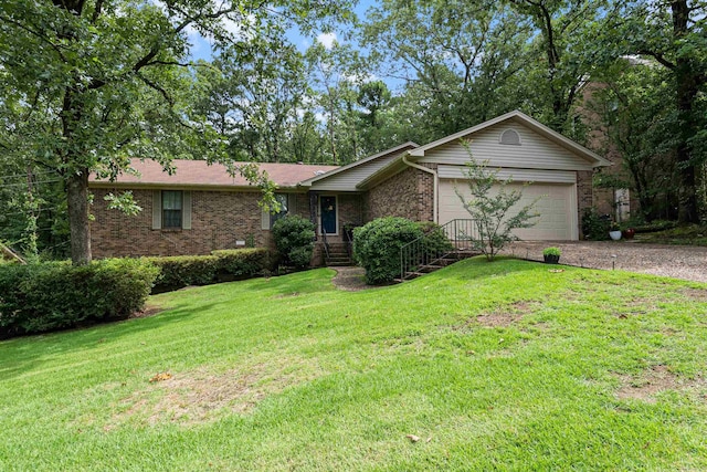 2608 Grist Mill Rd, Little Rock, AR 72227 - ranch-style house featuring gravel driveway, brick siding, a garage, and a front lawn