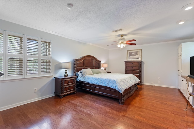 2608 Grist Mill Rd, Little Rock, AR 72227 - bedroom featuring a textured ceiling, dark wood-style floors, ornamental molding, and ceiling fan
