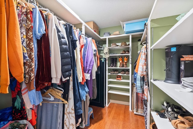 2608 Grist Mill Rd, Little Rock, AR 72227 - spacious closet featuring wood finished floors