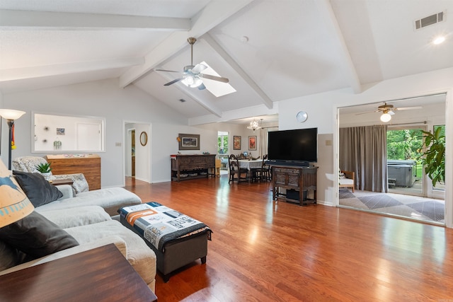 2608 Grist Mill Rd, Little Rock, AR 72227 - living room with ceiling fan, wood finished floors, a skylight, and a chandelier