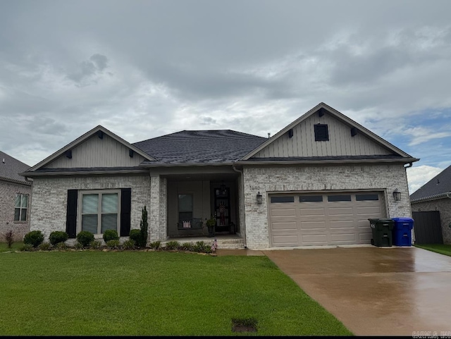 2690 Overcup Dr, Conway, AR 72034 - view of front of home featuring a front lawn, a garage, concrete driveway, covered porch, and brick siding