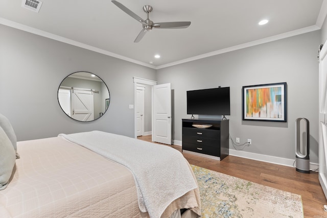2690 Overcup Dr, Conway, AR 72034 - bedroom with recessed lighting, wood finished floors, crown molding, and a ceiling fan