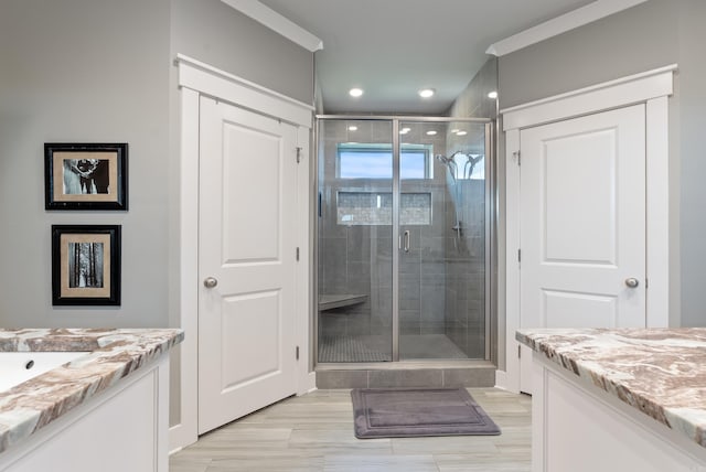2690 Overcup Dr, Conway, AR 72034 - bathroom featuring vanity, a shower stall, crown molding, and recessed lighting