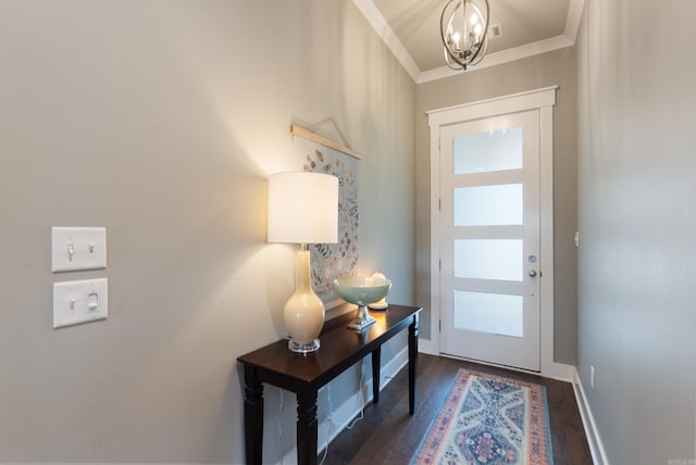2690 Overcup Dr, Conway, AR 72034 - entryway with a chandelier, dark wood-type flooring, and crown molding