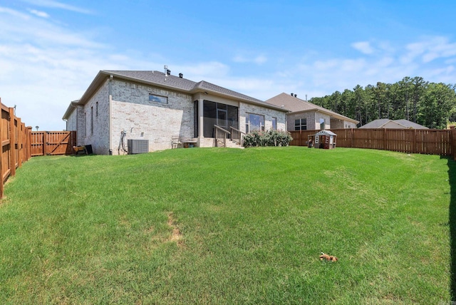 2690 Overcup Dr, Conway, AR 72034 - back of property with brick siding and a fenced backyard