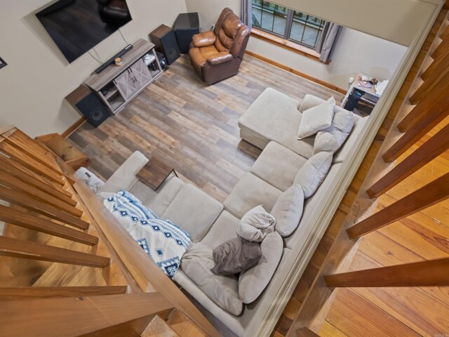 16 Almenara, Hot Springs Village, AR 71909 - living area featuring wood finished floors and stairs