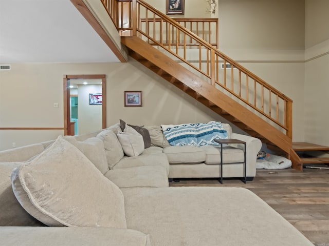 16 Almenara, Hot Springs Village, AR 71909 - living room featuring wood finished floors and stairway