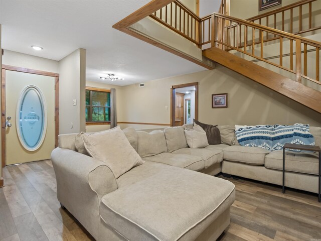 16 Almenara, Hot Springs Village, AR 71909 - living room featuring wood finished floors and stairs
