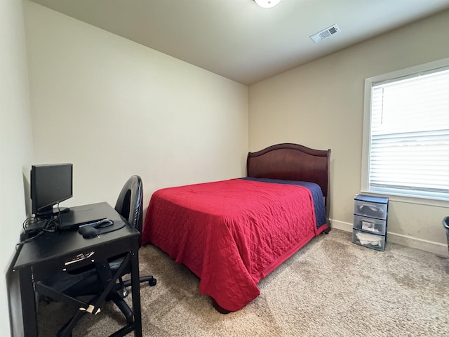 1500 Valmar St, Little Rock, AR 72204 - carpeted bedroom with baseboards and an office area