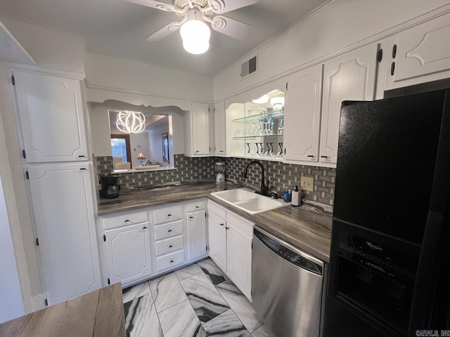 1824 N Hughes St, Little Rock, AR 72207 - kitchen featuring stainless steel dishwasher, black refrigerator with ice dispenser, dark countertops, a ceiling fan, and white cabinets
