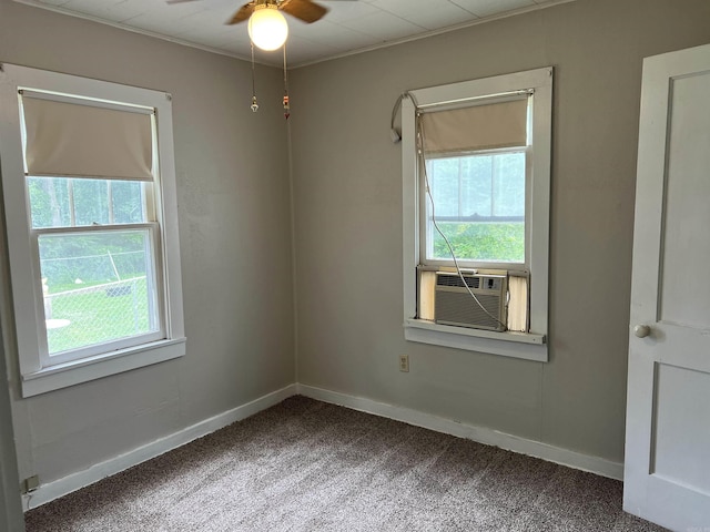 418 N Robinson St, Harrison, AR 72601 - spare room featuring cooling unit, carpet floors, and a ceiling fan