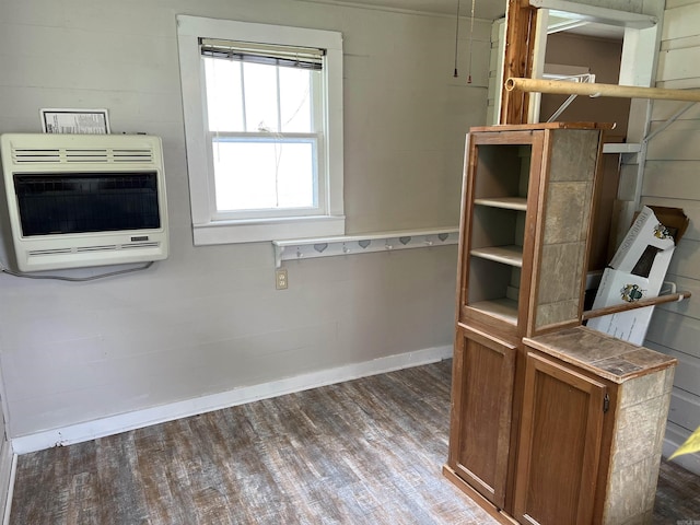 418 N Robinson St, Harrison, AR 72601 - kitchen featuring heating unit, wood finished floors, and brown cabinets