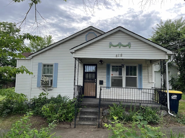 418 N Robinson St, Harrison, AR 72601 - view of front of property featuring a porch and cooling unit