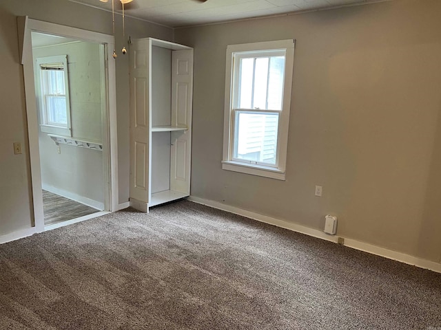 418 N Robinson St, Harrison, AR 72601 - unfurnished bedroom featuring carpet and baseboards