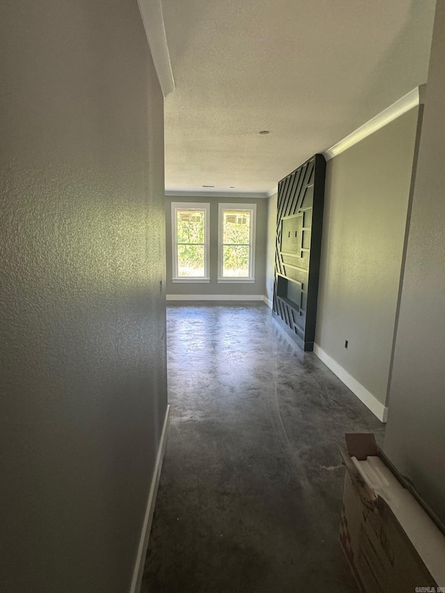5 Ridge View St, Vilonia, AR 72173 - unfurnished living room featuring concrete flooring and a fireplace