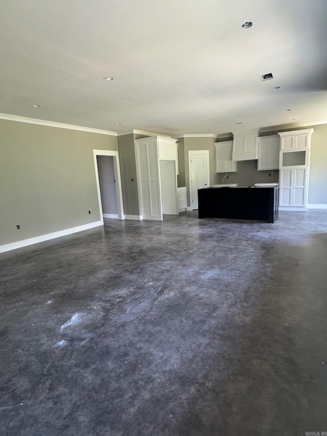 5 Ridge View St, Vilonia, AR 72173 - unfurnished living room featuring concrete floors and ornamental molding