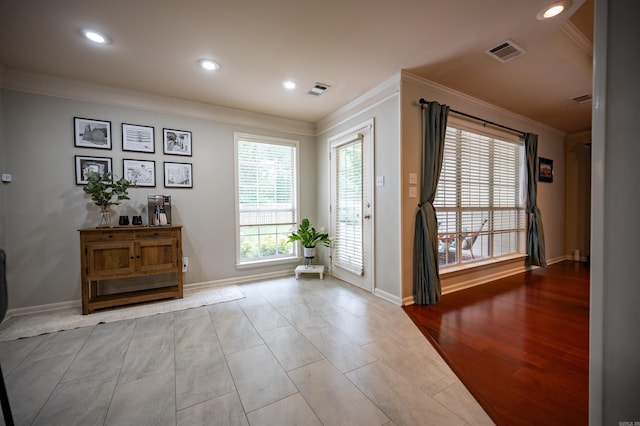 7139 Park Meadows Dr, Sherwood, AR 72120 - foyer entrance featuring ornamental molding and recessed lighting