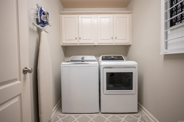7139 Park Meadows Dr, Sherwood, AR 72120 - laundry area with washing machine and dryer and cabinet space