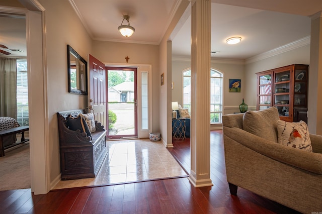 7139 Park Meadows Dr, Sherwood, AR 72120 - foyer featuring hardwood / wood-style flooring, decorative columns, and crown molding
