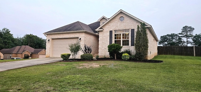 795 S Hill Dr, Jonesboro, AR 72401 - view of front facade with a garage, concrete driveway, and brick siding