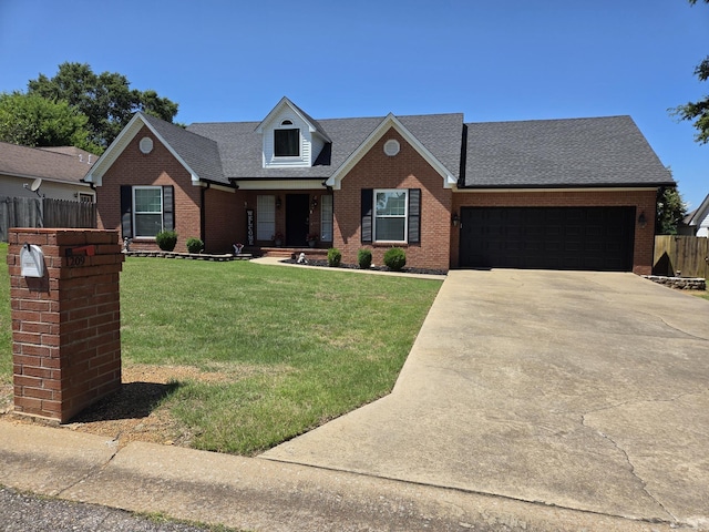 1209 Rehoboth, Searcy, AR 72143 - view of front facade featuring brick siding, concrete driveway, an attached garage, and roof with shingles