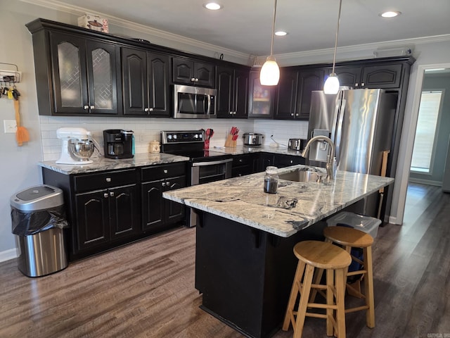 1209 Rehoboth, Searcy, AR 72143 - kitchen featuring stainless steel appliances, light stone countertops, dark wood finished floors, crown molding, and recessed lighting