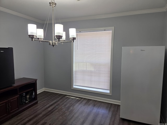 1209 Rehoboth, Searcy, AR 72143 - unfurnished dining area featuring a chandelier, dark wood finished floors, and ornamental molding