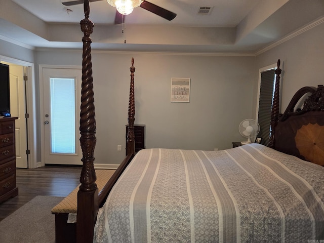 1209 Rehoboth, Searcy, AR 72143 - bedroom featuring wood finished floors, a raised ceiling, and a ceiling fan