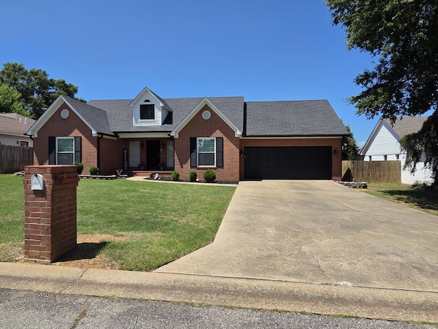1209 Rehoboth, Searcy, AR 72143 - view of front of house with brick siding, a garage, concrete driveway, and roof with shingles
