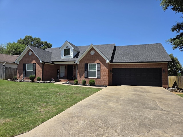 1209 Rehoboth, Searcy, AR 72143 - view of front of property featuring brick siding, concrete driveway, a garage, and a shingled roof
