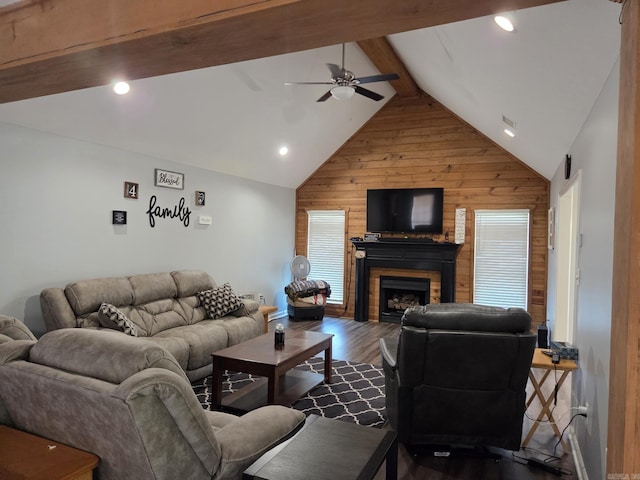 1209 Rehoboth, Searcy, AR 72143 - living area with wooden walls, dark wood-style floors, a fireplace, a ceiling fan, and recessed lighting