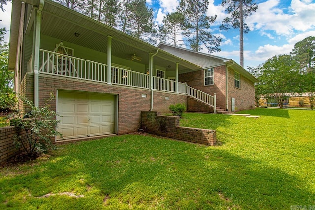 1226 Grayson Cir, Malvern, AR 72104 - view of side of home featuring a yard, an attached garage, brick siding, a ceiling fan, and stairs