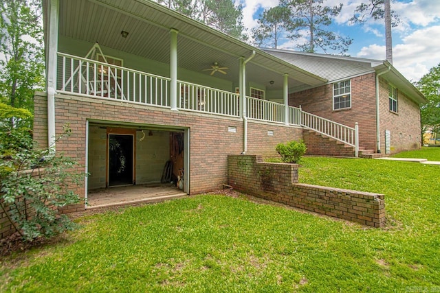 1226 Grayson Cir, Malvern, AR 72104 - rear view of house with a lawn and brick siding