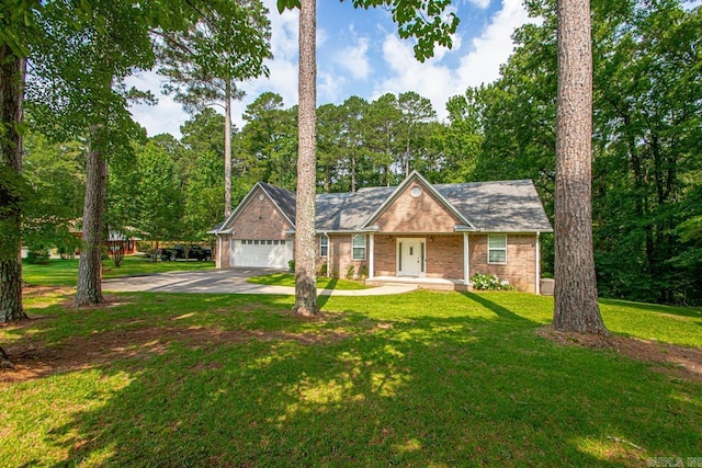 1226 Grayson Cir, Malvern, AR 72104 - single story home featuring a garage, concrete driveway, a front yard, and brick siding
