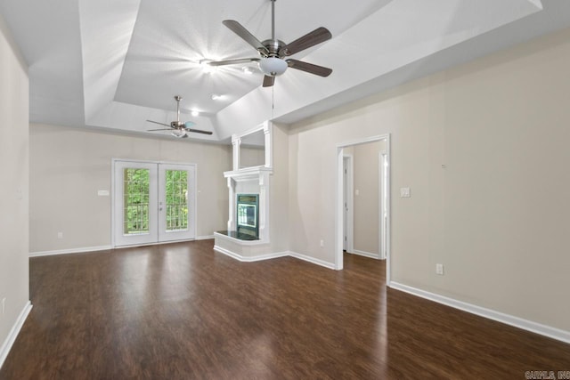 1226 Grayson Cir, Malvern, AR 72104 - unfurnished living room with a ceiling fan, wood finished floors, a raised ceiling, and a glass covered fireplace