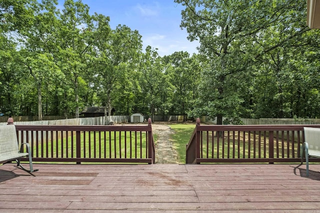 5132 Austin Lakes Cir, Sherwood, AR 72120 - wooden terrace with a shed and a fenced backyard