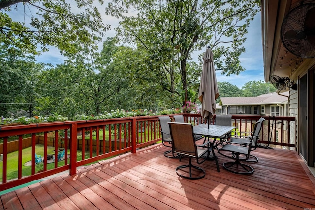 2908 Breckenridge Dr, Little Rock, AR 72227 - wooden deck featuring outdoor dining area and a yard