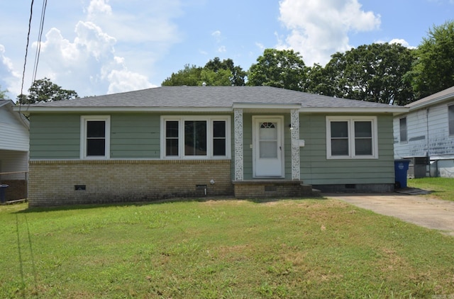 view of front of property with crawl space, brick siding, a front yard, and entry steps