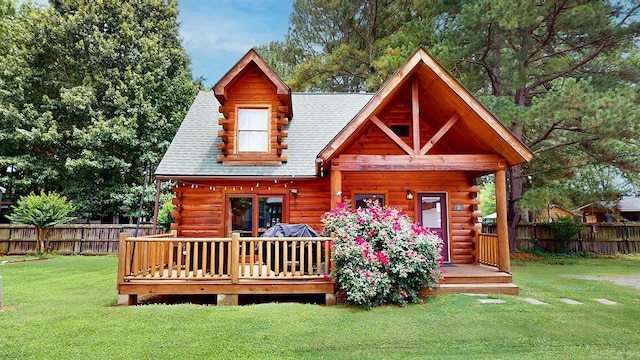 25 Jared Cir, Heber Springs, AR 72543 - rear view of house featuring log siding, a wooden deck, and a shingled roof