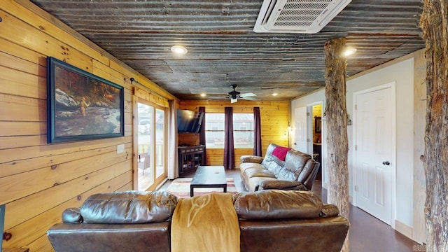 25 Jared Cir, Heber Springs, AR 72543 - living room featuring ceiling fan and wooden walls
