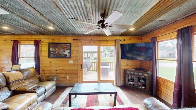 25 Jared Cir, Heber Springs, AR 72543 - living room with wooden ceiling, plenty of natural light, wood walls, a ceiling fan, and wood finished floors