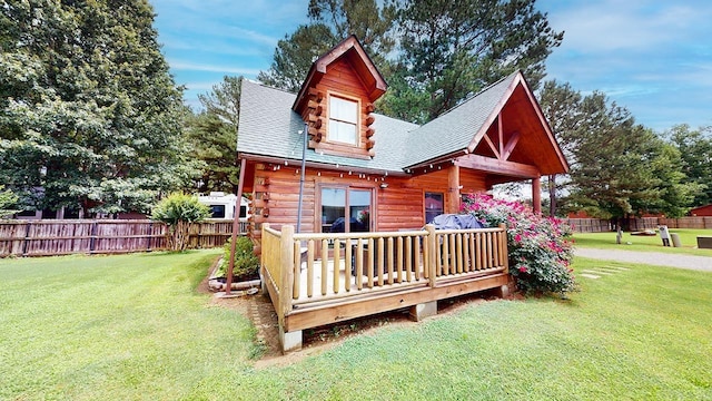 25 Jared Cir, Heber Springs, AR 72543 - rear view of house featuring log exterior, a deck, and roof with shingles