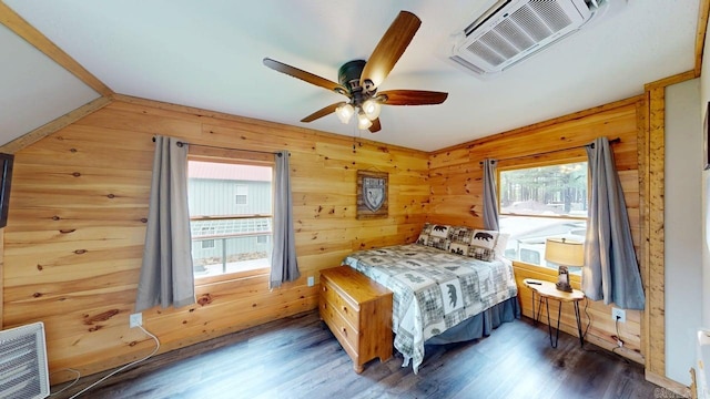 25 Jared Cir, Heber Springs, AR 72543 - bedroom featuring wooden walls, wood finished floors, and a ceiling fan