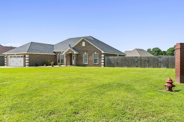 1726 Fox Run Dr, Wynne, AR 72396 - view of front of house featuring a garage, brick siding, and a shingled roof